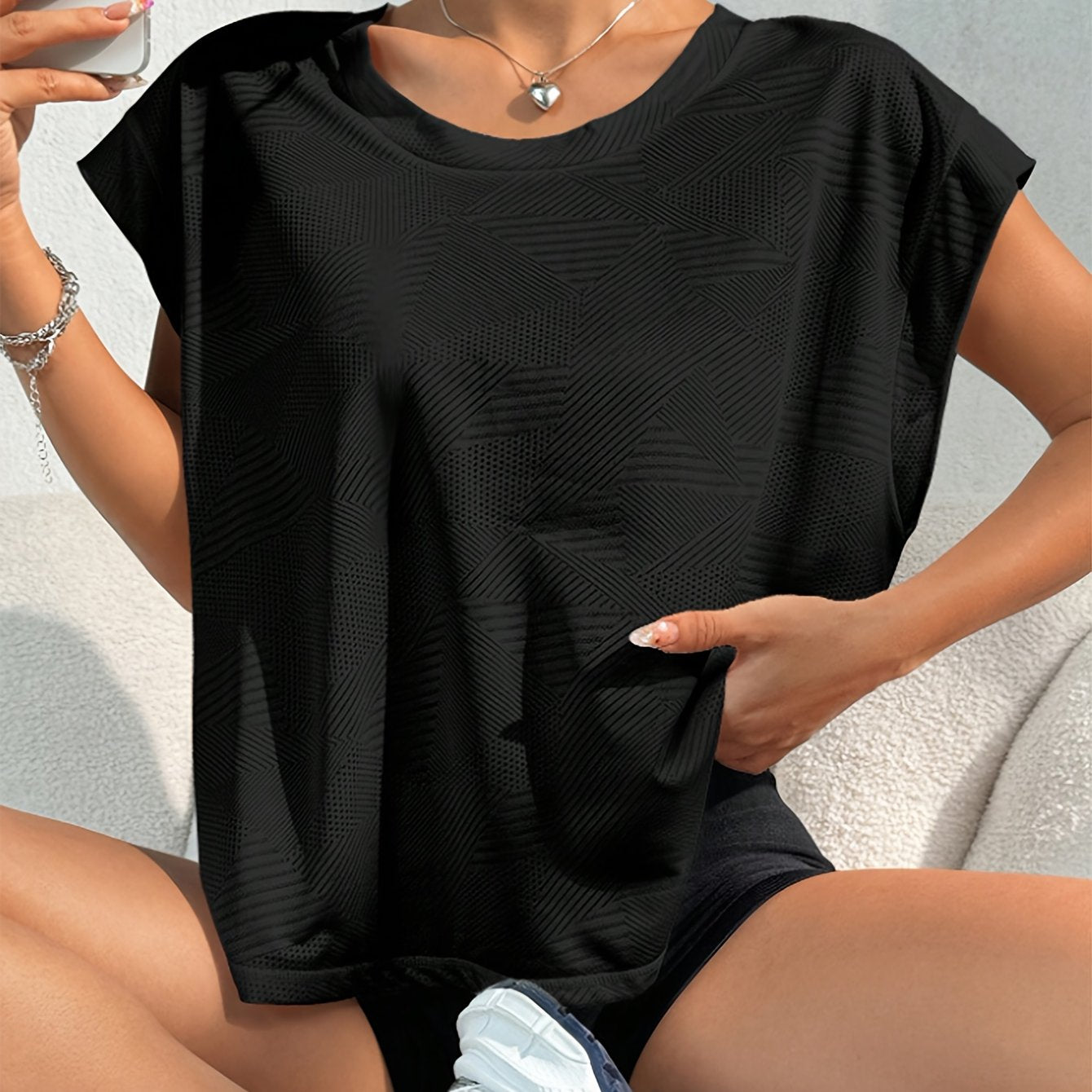 Aérien Soft – T-shirt léger semi-transparent, coupe ample et fluide.