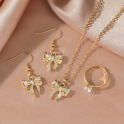 Noéline Strass – collier et boucles d’oreilles à nœud papillon