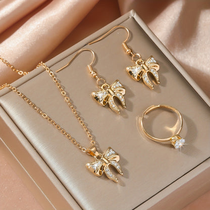 Noéline Strass – collier et boucles d’oreilles à nœud papillon