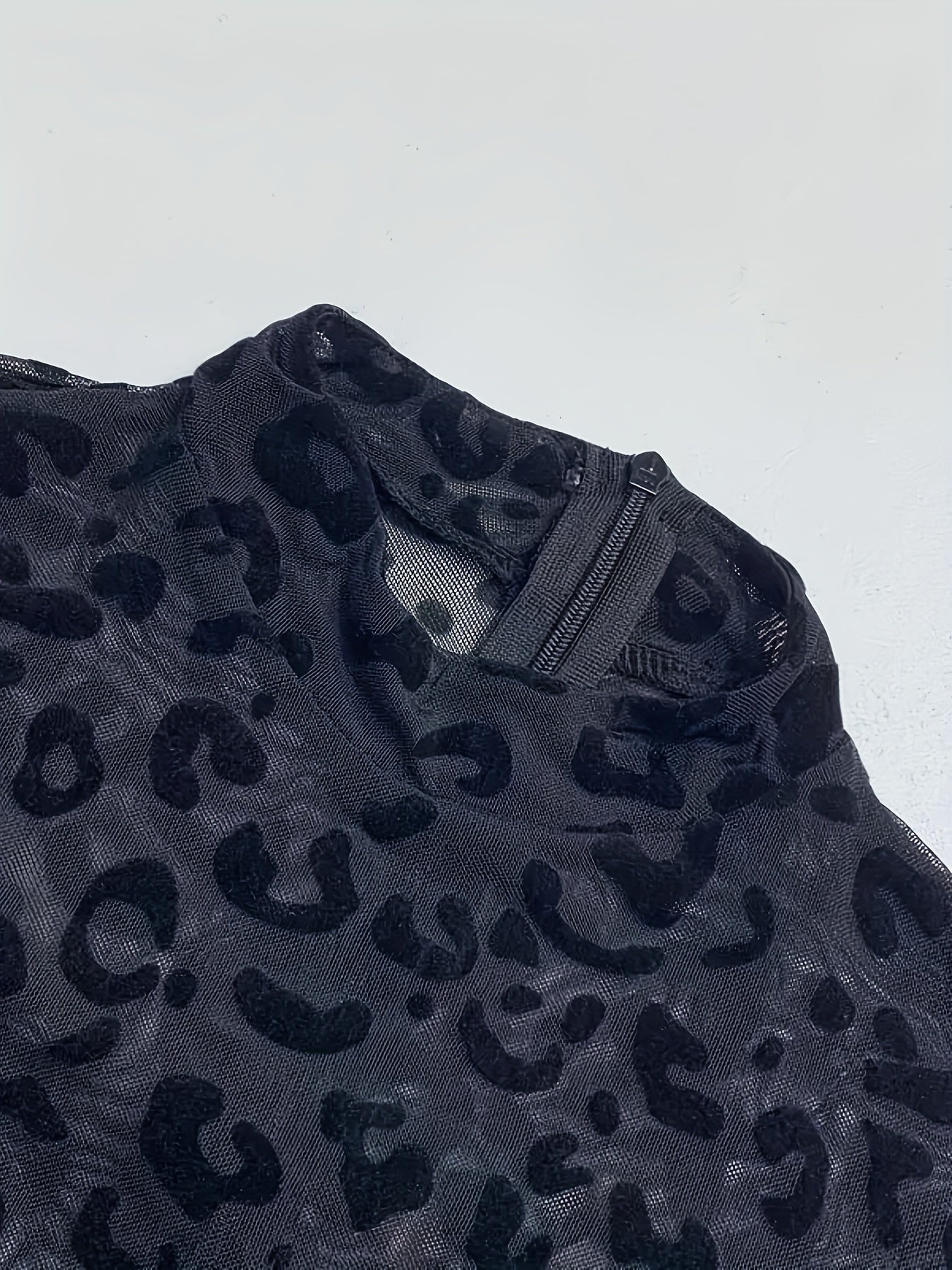 Neopard- Combinaison Léopard noir