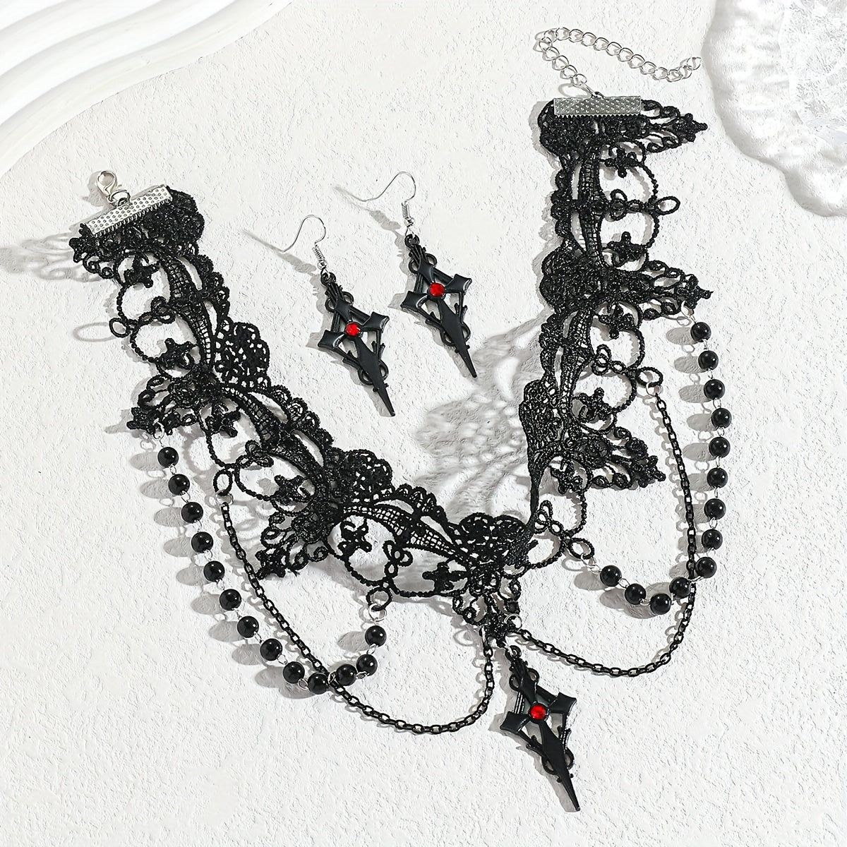 Aigle- Ensemble ras de cou (1 collier + 1 boucles)