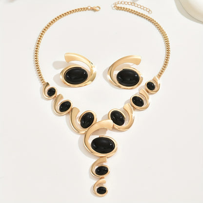 Spirale Bohème -Un design en escargot serti de strass noirs