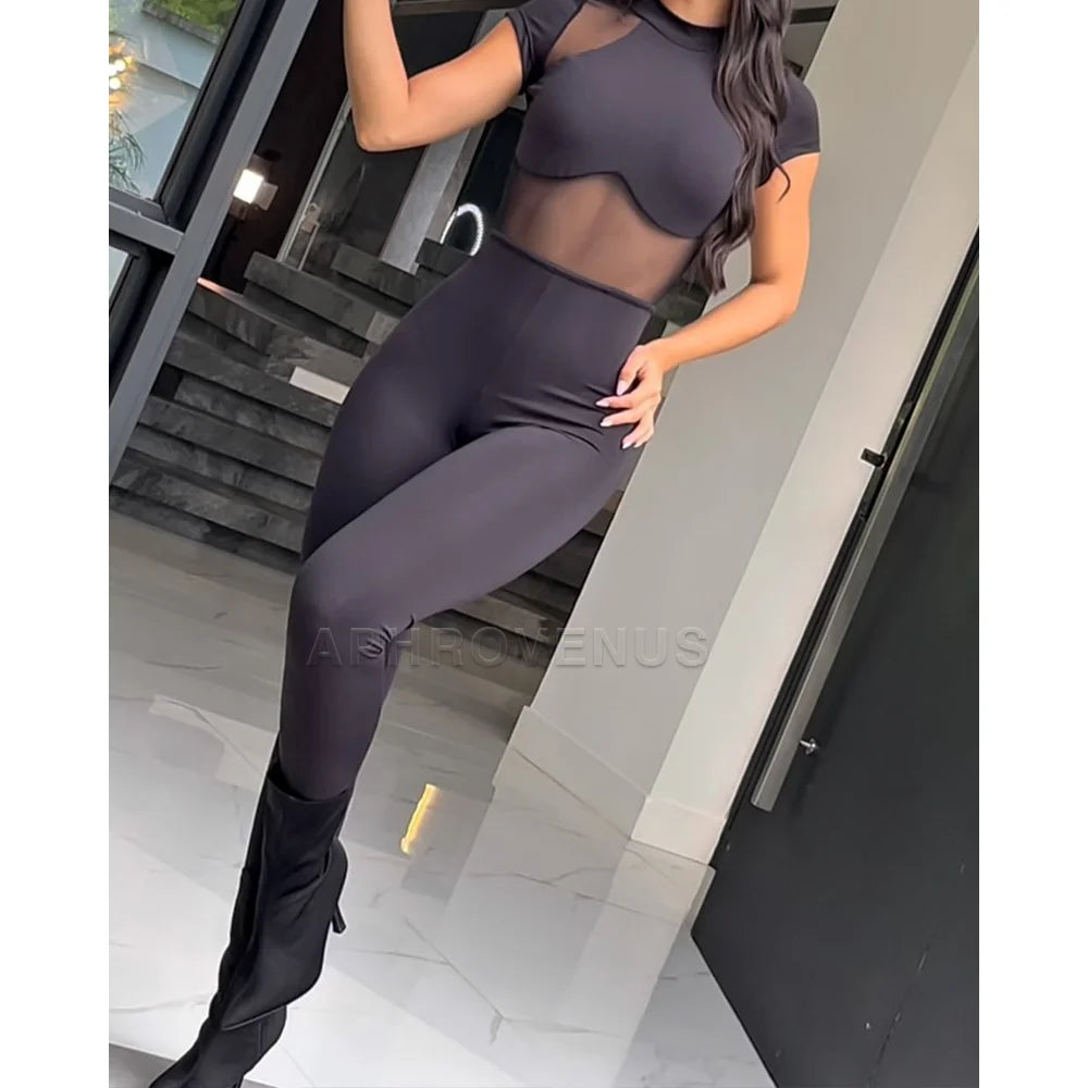 NewCombina- Combi de sport pour femme à manches courtes