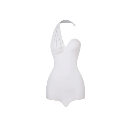 DuoFrange- Top asymétrique et jupe à franges pour un look rythmé.