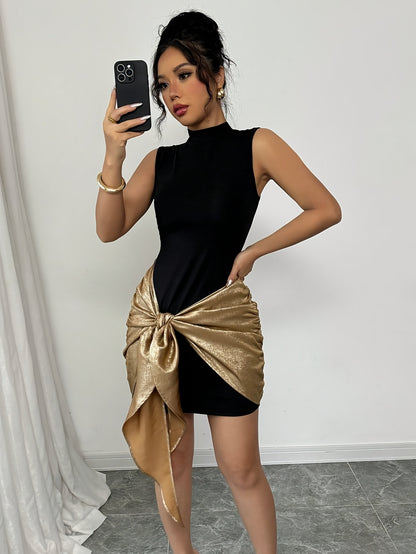 ORÉLIA – Mini robe dorée à volants