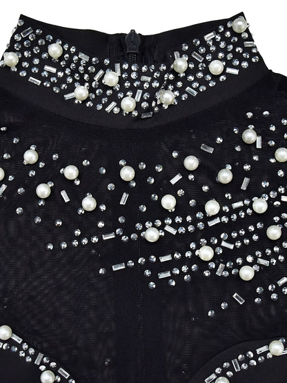 Strass Diva – Maille noire, strass raffinés, allure de star.